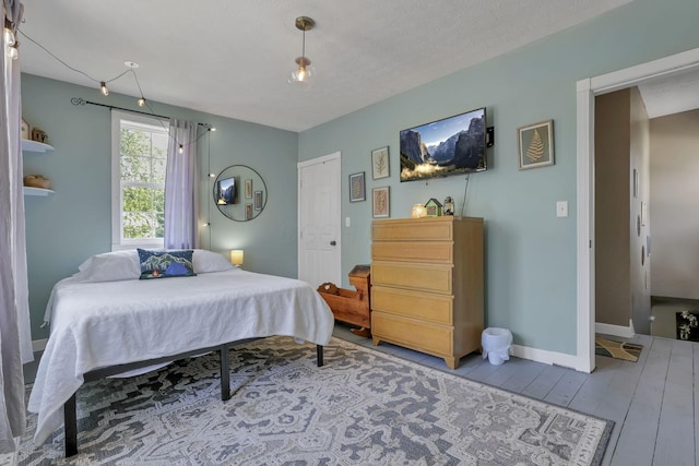107 N Factory St, Baltimore, OH 43105 - bedroom featuring wood finished floors and baseboards