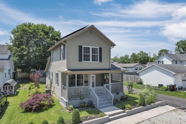 107 N Factory St, Baltimore, OH 43105 - view of front of property featuring a porch