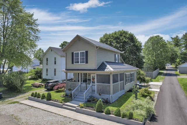 107 N Factory St, Baltimore, OH 43105 - view of front facade with a porch and a metal roof