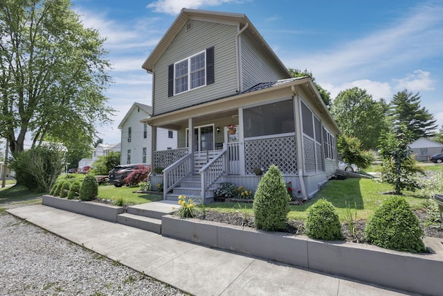 107 N Factory St, Baltimore, OH 43105 - view of front of home featuring covered porch and a front lawn