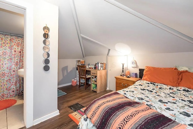184 E Patterson Ave, Columbus, OH 43202 - bedroom with vaulted ceiling and wood finished floors