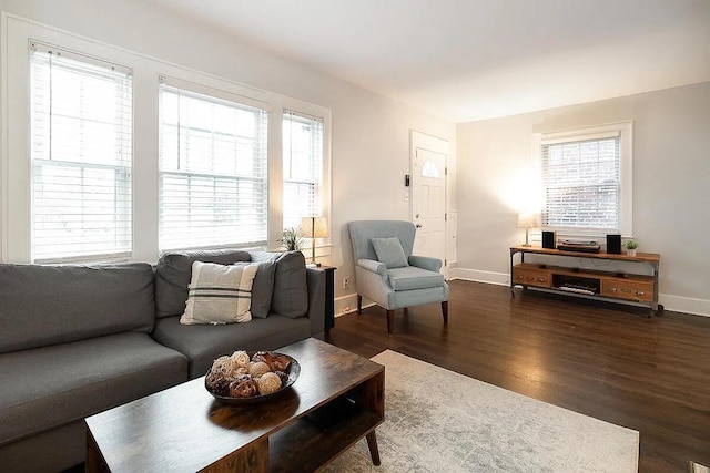 184 E Patterson Ave, Columbus, OH 43202 - living area with dark wood-style flooring and baseboards