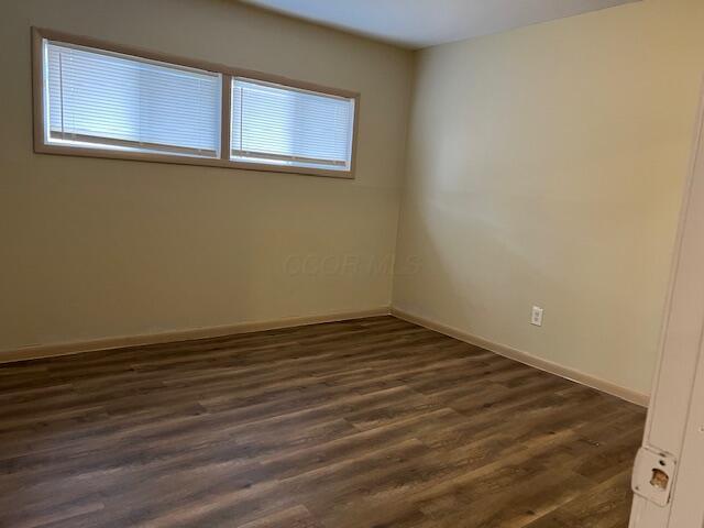 885-887 Derrer Rd, Columbus, OH 43204 - unfurnished room featuring plenty of natural light and dark wood-type flooring