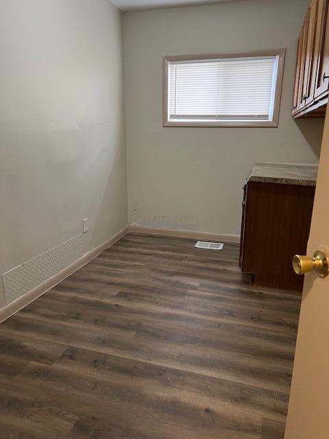 885-887 Derrer Rd, Columbus, OH 43204 - unfurnished bedroom featuring dark wood-type flooring