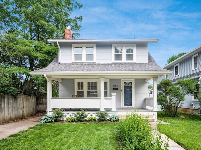 1368 Elmwood Ave, Columbus, OH 43212 - bungalow with a chimney and covered porch