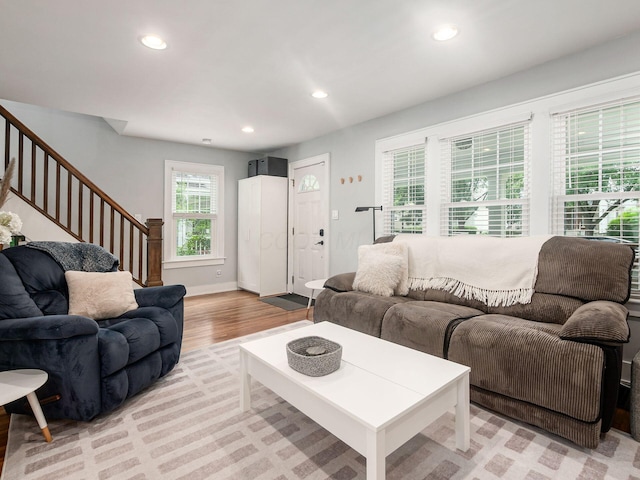 1368 Elmwood Ave, Columbus, OH 43212 - living room with stairs, light wood-style flooring, and recessed lighting