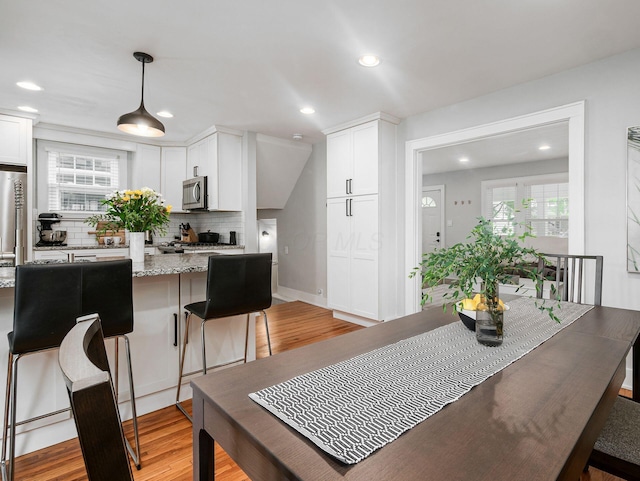 1368 Elmwood Ave, Columbus, OH 43212 - dining space featuring light wood-style floors, plenty of natural light, and recessed lighting