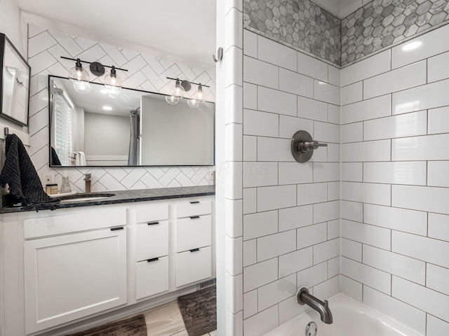 1368 Elmwood Ave, Columbus, OH 43212 - bathroom featuring vanity, shower / bath combo with shower curtain, and decorative backsplash