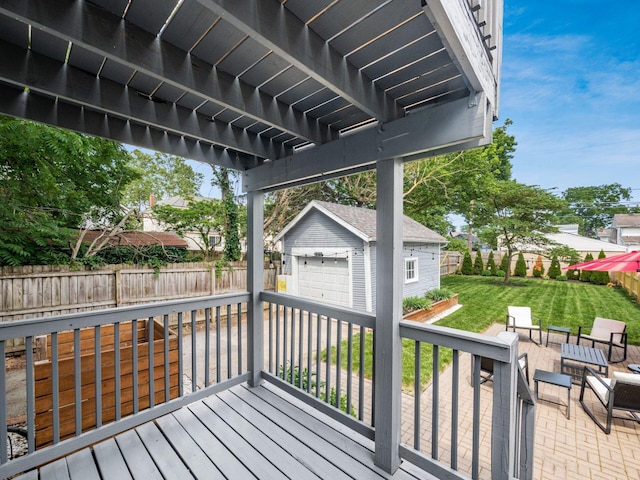 1368 Elmwood Ave, Columbus, OH 43212 - deck featuring a garage, an outbuilding, and a fenced backyard