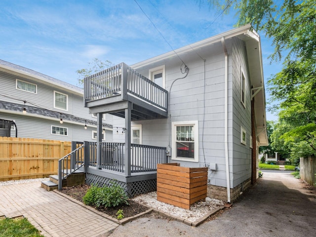 1368 Elmwood Ave, Columbus, OH 43212 - rear view of house with a balcony and a wooden deck