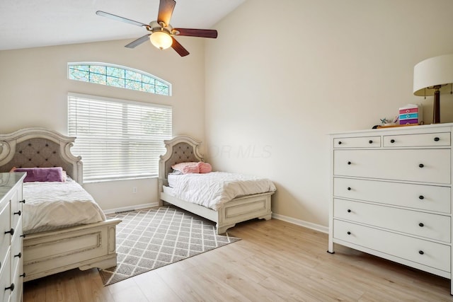 5535 Village Xing, Hilliard, OH 43026 - bedroom with light wood-style flooring, a ceiling fan, and high vaulted ceiling