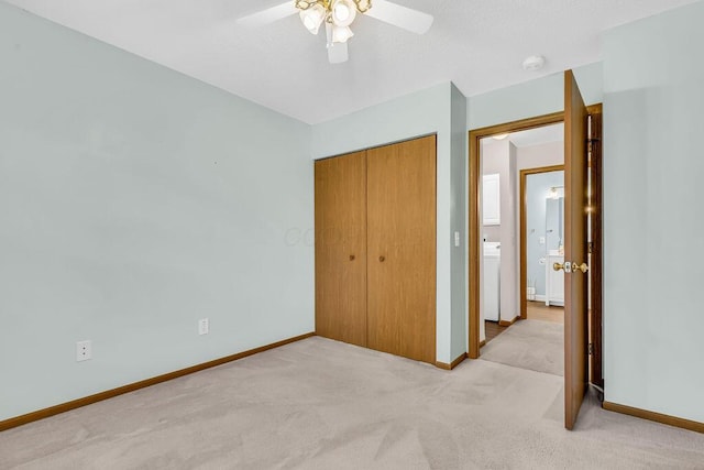 978 Kingsbury Ct, Newark, OH 43055 - unfurnished bedroom featuring light colored carpet, a closet, a ceiling fan, and washer / dryer