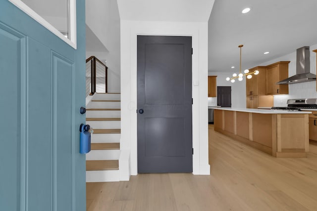 376 E Markison Ave, Columbus, OH 43207 - foyer entrance featuring light wood-style floors, stairway, and recessed lighting