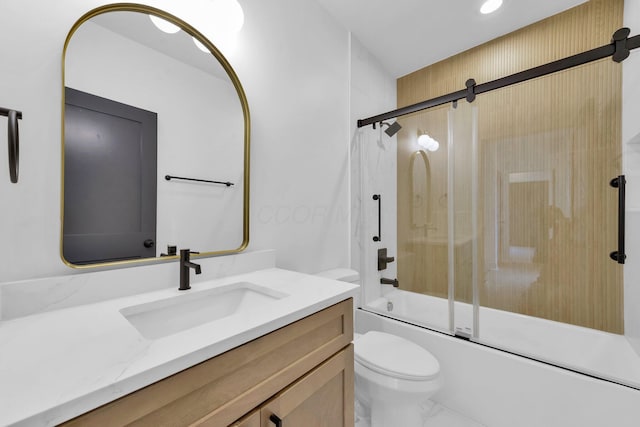 376 E Markison Ave, Columbus, OH 43207 - bathroom featuring marble finish floors, vanity, and bath / shower combo with glass door
