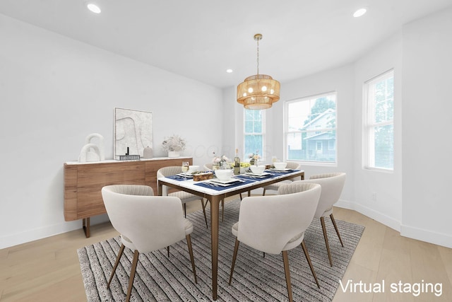 376 E Markison Ave, Columbus, OH 43207 - dining area featuring a chandelier, recessed lighting, and light wood-type flooring