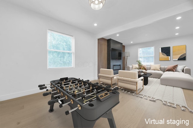 376 E Markison Ave, Columbus, OH 43207 - rec room featuring wood finished floors and recessed lighting