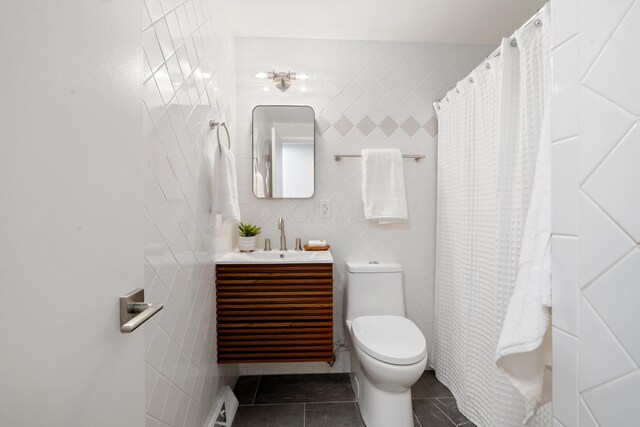75 S Gould Rd, Columbus, OH 43209 - full bathroom with tile walls, vanity, tile patterned flooring, and curtained shower