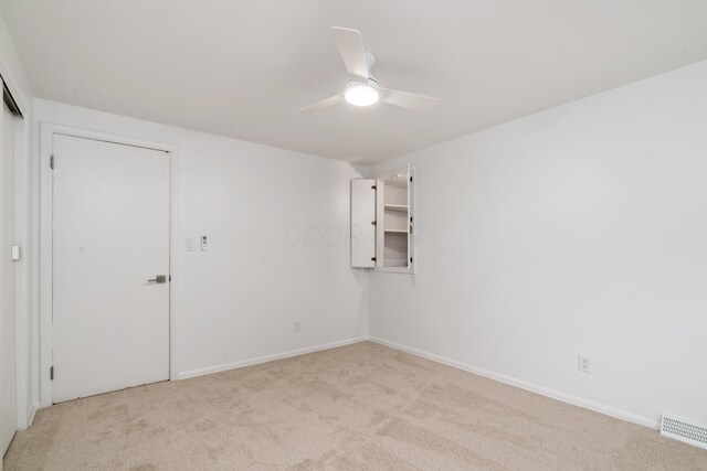 75 S Gould Rd, Columbus, OH 43209 - unfurnished room featuring a ceiling fan and light carpet