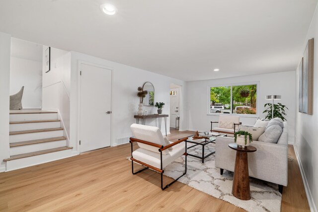 75 S Gould Rd, Columbus, OH 43209 - living area with light wood-type flooring, stairway, and recessed lighting