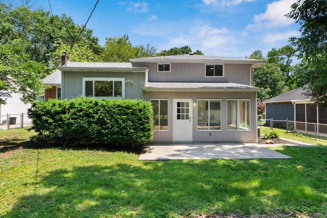 75 S Gould Rd, Columbus, OH 43209 - rear view of house featuring a patio, a chimney, and a shingled roof