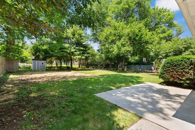 75 S Gould Rd, Columbus, OH 43209 - view of yard with a storage shed and a patio area