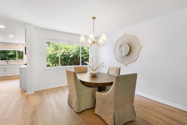 75 S Gould Rd, Columbus, OH 43209 - dining room with a chandelier, light wood-type flooring, and recessed lighting