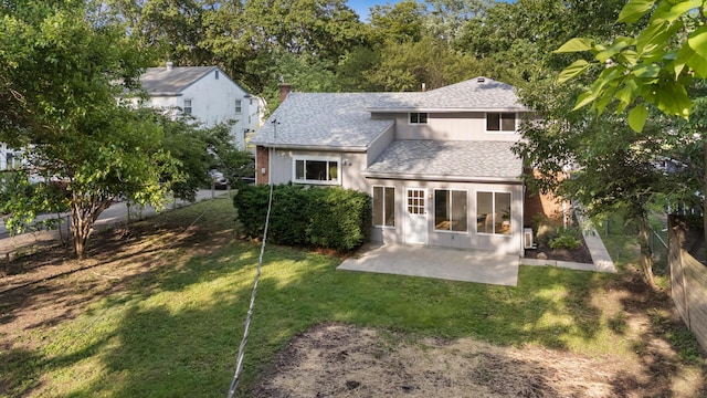 75 S Gould Rd, Columbus, OH 43209 - rear view of property featuring a shingled roof, a patio area, and a chimney