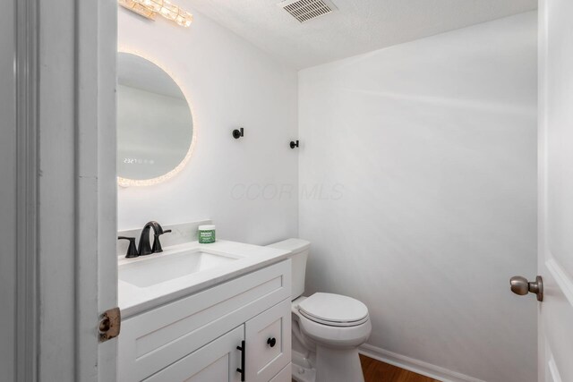 6290 Downwing Ln, Columbus, OH 43230 - bathroom with wood finished floors and vanity