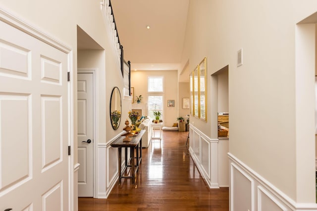 5893 Dunheath Loop, Dublin, OH 43016 - hall featuring dark wood finished floors and a towering ceiling