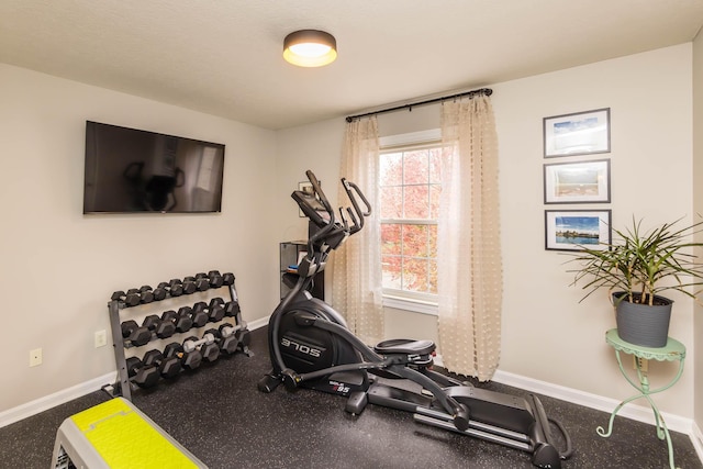 5893 Dunheath Loop, Dublin, OH 43016 - exercise room featuring baseboards