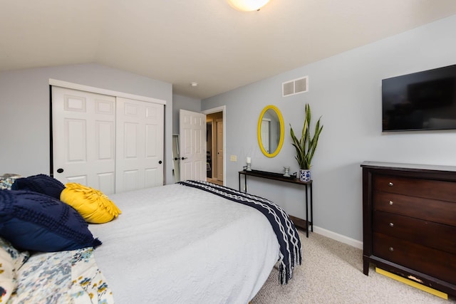 5893 Dunheath Loop, Dublin, OH 43016 - bedroom with light carpet, a closet, and lofted ceiling