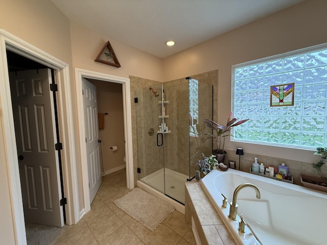5893 Dunheath Loop, Dublin, OH 43016 - bathroom with a garden tub, a stall shower, tile patterned floors, and recessed lighting