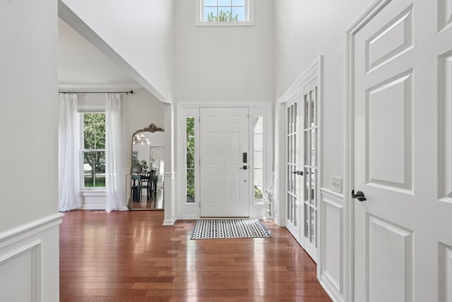 5893 Dunheath Loop, Dublin, OH 43016 - foyer entrance featuring a high ceiling and hardwood / wood-style floors