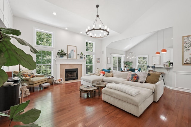 5893 Dunheath Loop, Dublin, OH 43016 - living room with a chandelier, high vaulted ceiling, wood-type flooring, healthy amount of natural light, and recessed lighting
