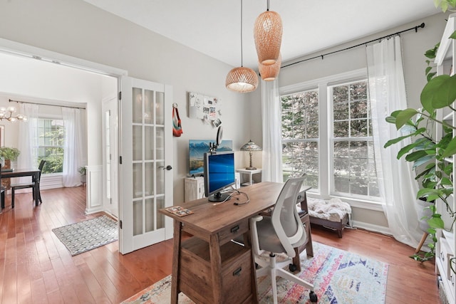 5893 Dunheath Loop, Dublin, OH 43016 - office with hardwood / wood-style flooring, a chandelier, and french doors