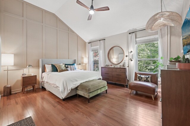 5893 Dunheath Loop, Dublin, OH 43016 - bedroom featuring a decorative wall, wood-type flooring, high vaulted ceiling, and a ceiling fan