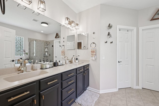 5893 Dunheath Loop, Dublin, OH 43016 - bathroom featuring a shower stall, double vanity, and tile patterned flooring