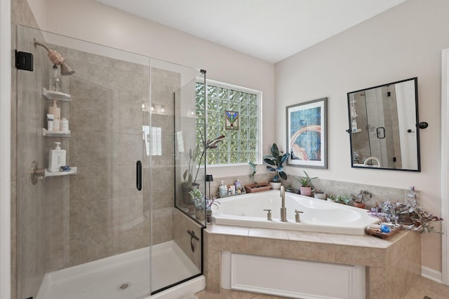 5893 Dunheath Loop, Dublin, OH 43016 - bathroom featuring a stall shower and a garden tub