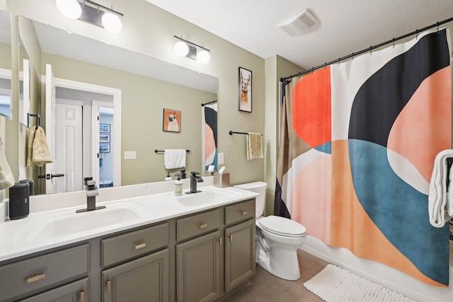 5893 Dunheath Loop, Dublin, OH 43016 - bathroom featuring tile patterned flooring and double vanity