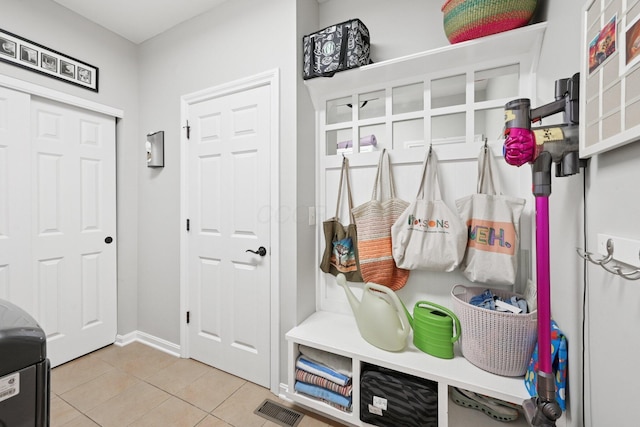 5893 Dunheath Loop, Dublin, OH 43016 - mudroom with tile patterned flooring and baseboards