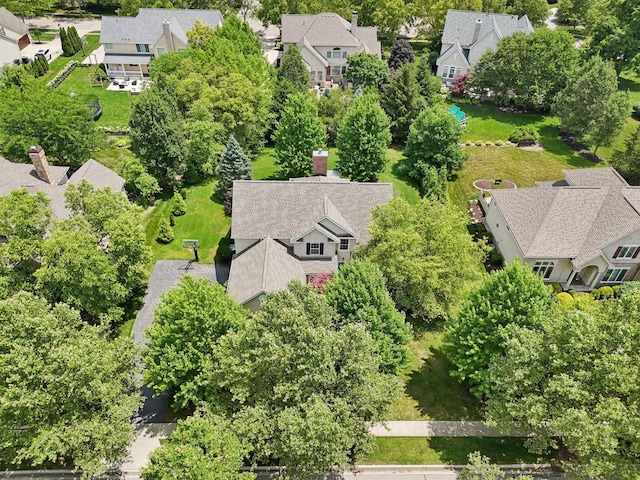5893 Dunheath Loop, Dublin, OH 43016 - aerial perspective of suburban area with a tree filled landscape