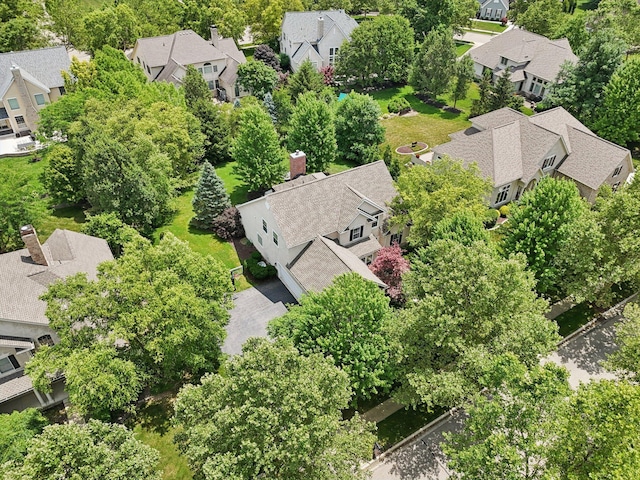 5893 Dunheath Loop, Dublin, OH 43016 - aerial perspective of suburban area with a tree filled landscape