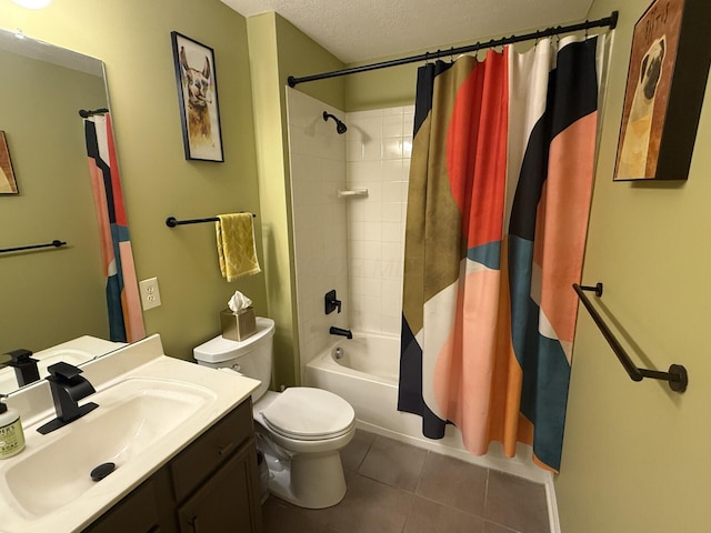 5893 Dunheath Loop, Dublin, OH 43016 - full bathroom featuring vanity, tile patterned floors, shower / bath combo, and a textured ceiling