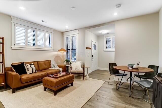 1301 Highland St, Columbus, OH 43201 - living area featuring light wood-style floors, baseboards, and recessed lighting