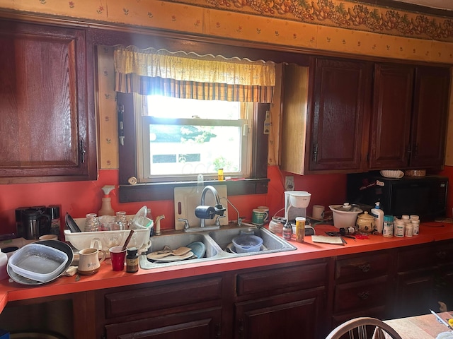 7365 Hayden Run Rd, Hilliard, OH 43026 - kitchen with light countertops and black microwave