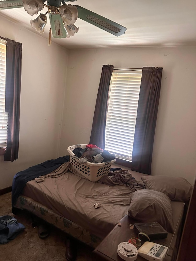 7365 Hayden Run Rd, Hilliard, OH 43026 - carpeted bedroom with a ceiling fan