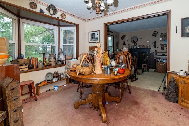 4019 Mink St SW, Pataskala, OH 43062 - carpeted dining space featuring a chandelier