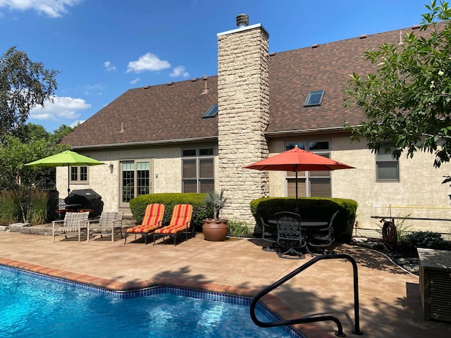 7524 Cumberland Cir NW, Canal Winchester, OH 43110 - swimming pool featuring a patio area, area for grilling, and outdoor dining area