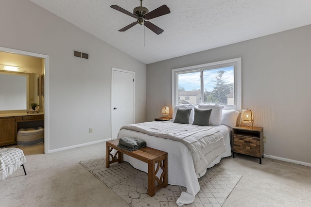 2356 Gavinley Way, Columbus, OH 43220 - bedroom with light colored carpet, vaulted ceiling, baseboards, connected bathroom, and a ceiling fan