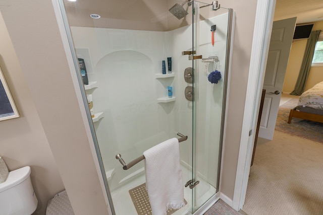 1108 Langland Dr, Columbus, OH 43220 - bathroom featuring ensuite bath, a shower stall, and toilet